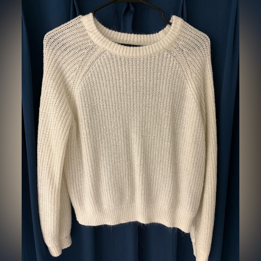 white sweater